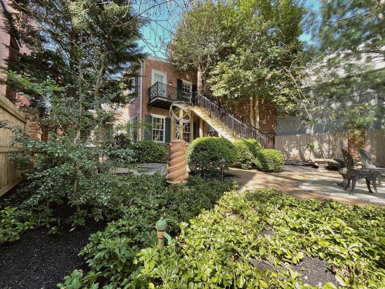 A quiet courtyard garden behind a historic Lancaster home